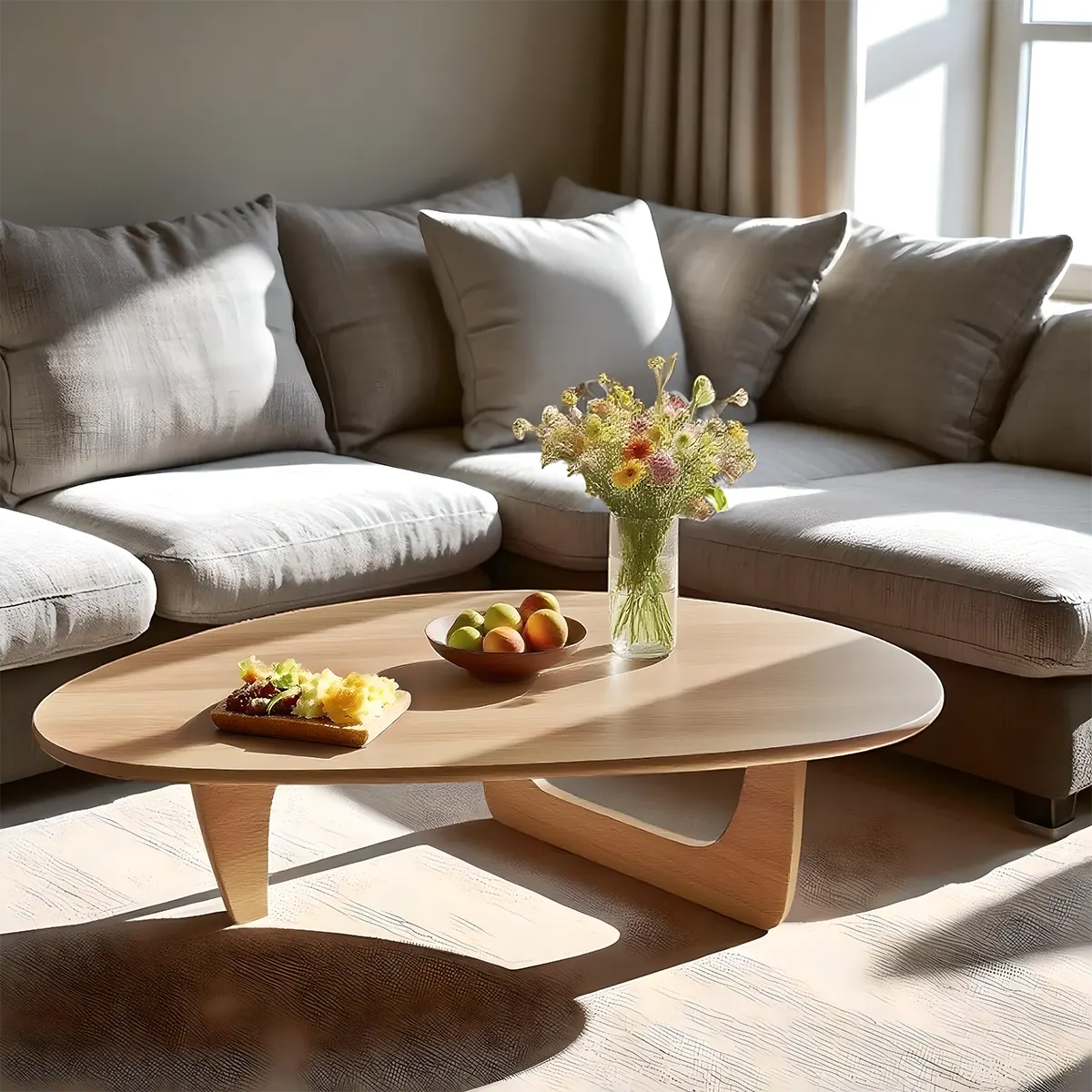 Minimalist round wooden coffee table, gently curved design combined with colors create a soft, cozy feeling